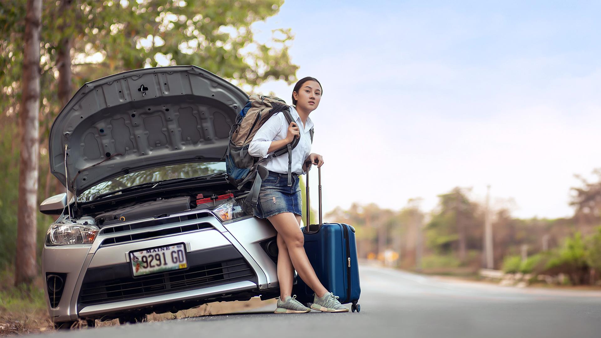 1920x1080-protection-interruption-voyage-femme-sac-a-dos-valise.jpg